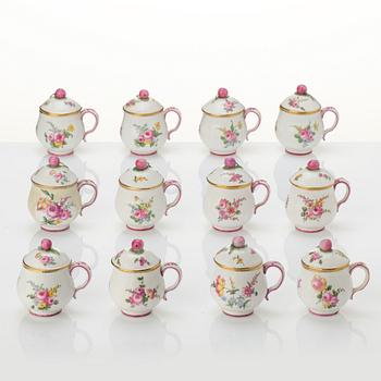 A set of 12 Swedish Marieberg soft paste custard cups with covers, 18th century.