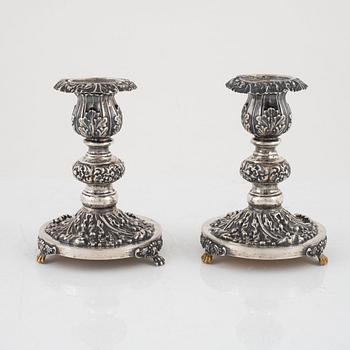 Candlesticks, a pair, Gustaf Möllenborg, Stockholm 1844, and two salt cellars including CG Hallberg, Stockholm 1897.