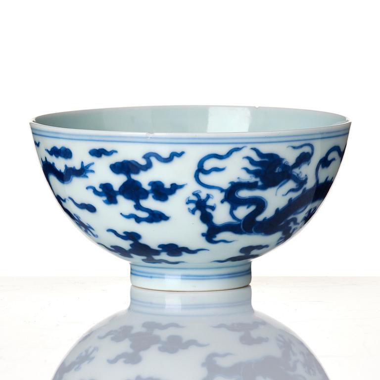 A blue and white 'five clawed dragon' cup, Qing dynasty, with Yongzheng mark and of the period (1723-35).