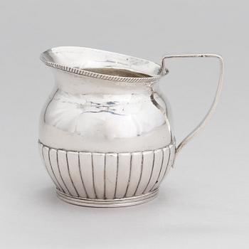 A silver, cream jug, Cyrillic maker's mark Sinkoni, Finland 1824.