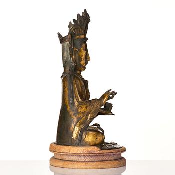 A gilt bronze figure of Guanyin, Ming dynasty, 16th/17th Century.