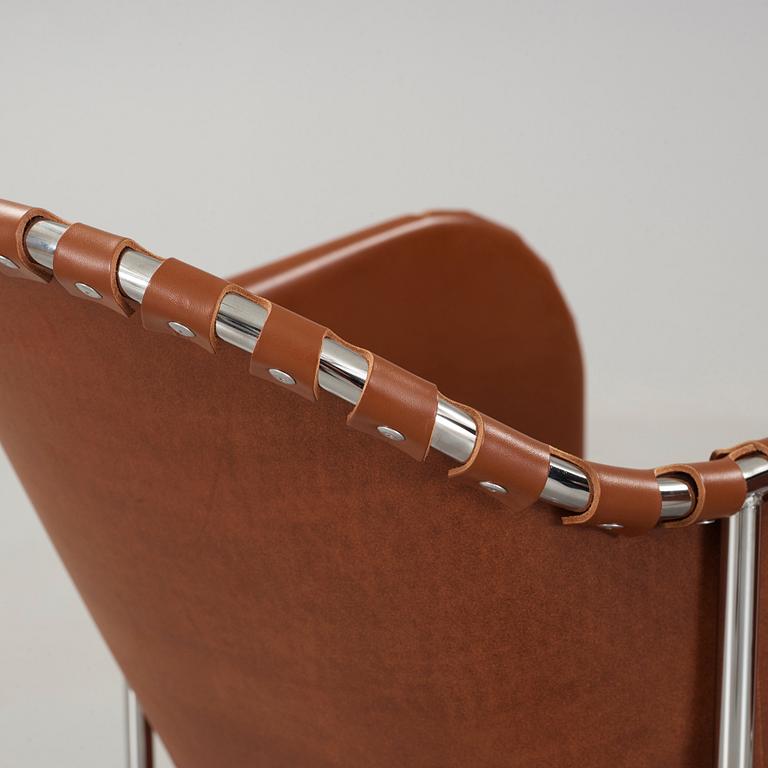 Mats Theselius, A pair of 'Bruno' brown leather and steel easy chairs, Källemo, Sweden.