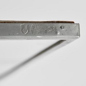 Firma Svenskt Tenn, a pewter wall mirror, Stockholm, 1935.