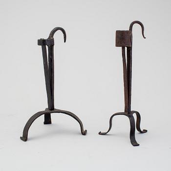 A lot of five wrought iron candle sticks 19/20th century.