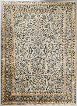 A Keshan rug, signed, ca 370 x 268 cm.