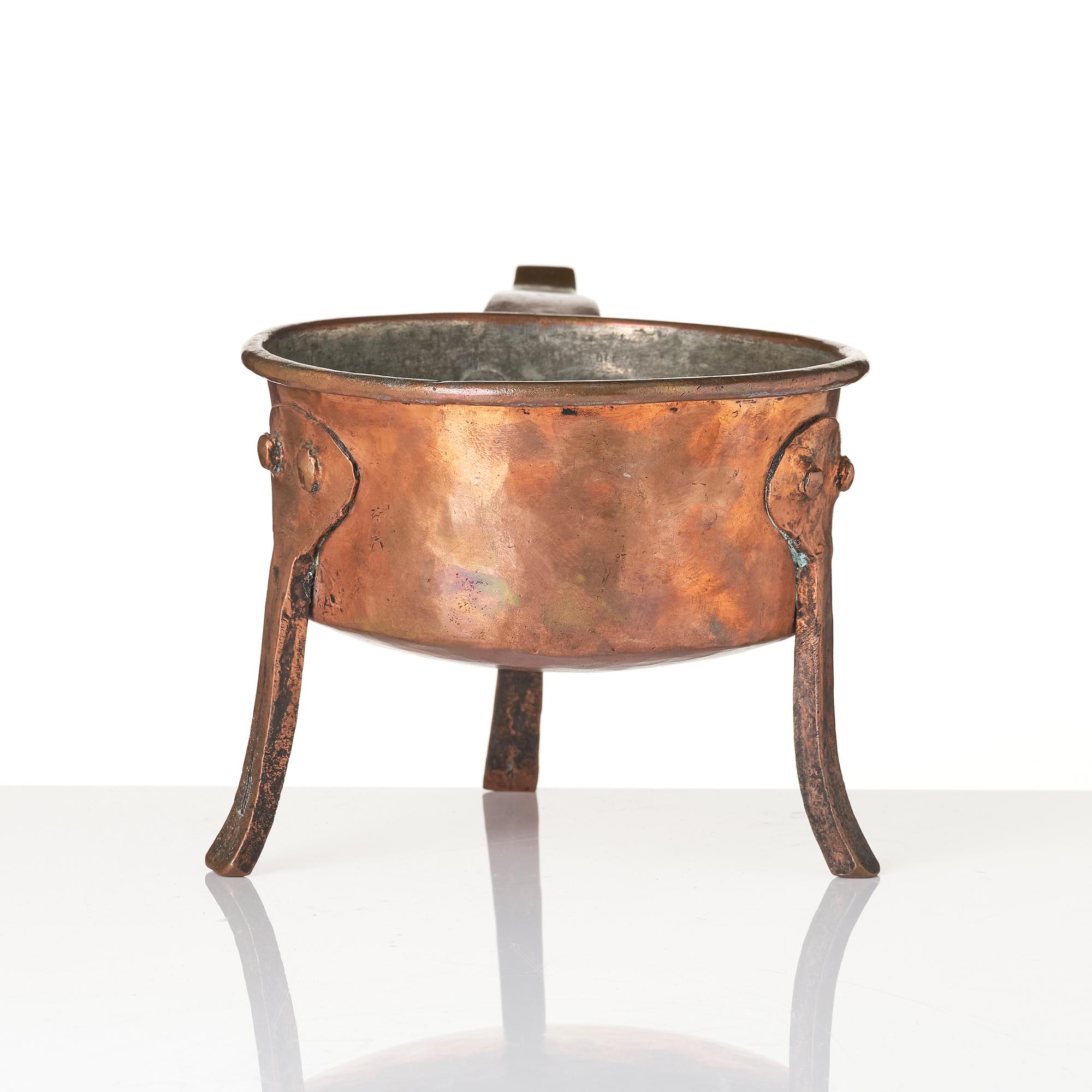 A copper saucepan, 18th century.