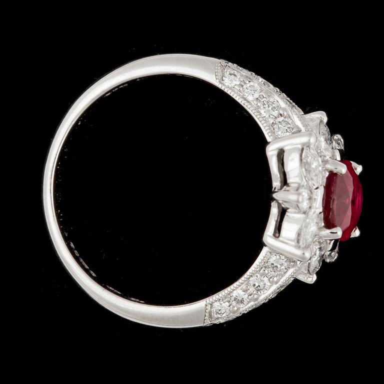 A ruby, app. 1.20 cts, and brilliant cut diamond ring, tot. app. 1. ct.