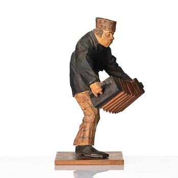 Axel Petersson Döderhultarn, Standing accordionist.