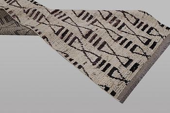 A runner carpet, morocco, c. 374 x 80 cm.