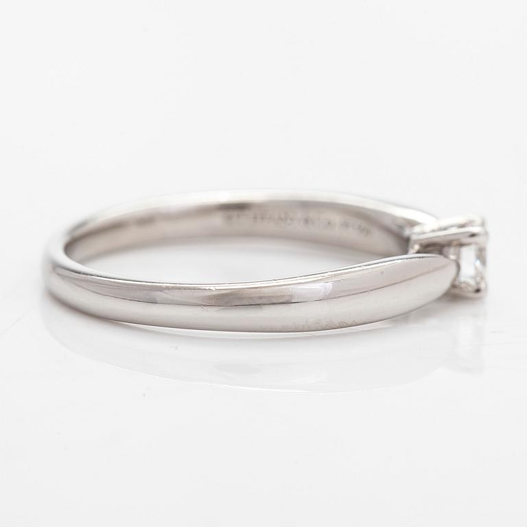 Tiffany & Co, a 'Harmony' platinum ring, with a brilliant-cut diamond approx. 0.17 ct.
