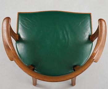 Alfred Grenander, a mahogany and green leather armchair, ca 1905.