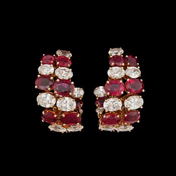 1061. A pair of David Morris, ruby, total carat weight ca 10.35 cts and oval-cut diamonds, tot. circa 7.10 cts, earrings.