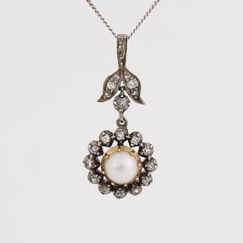 Old-cut diamond and pearl pendant.