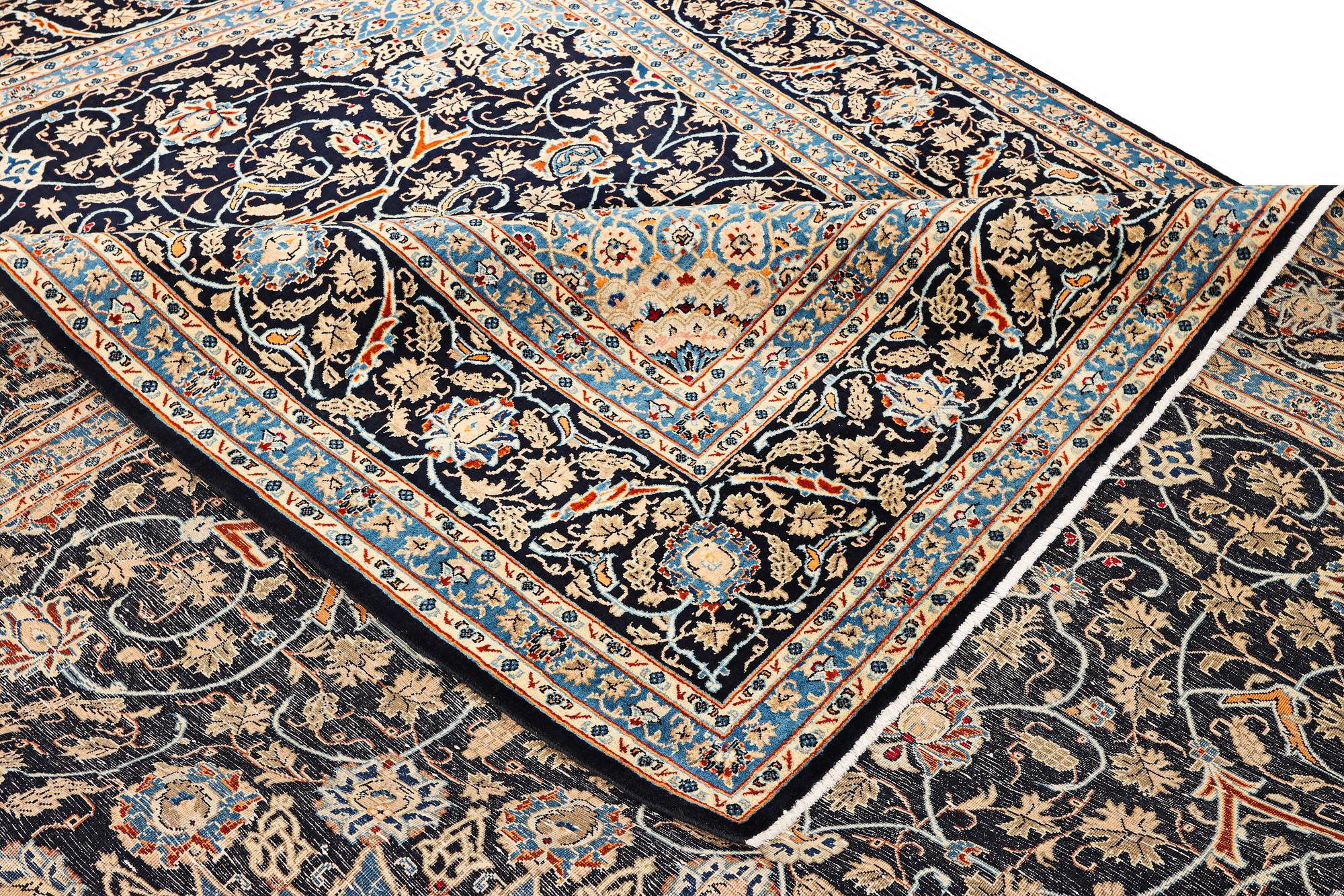 A Kashan carpet, c. 397 x 300 cm.