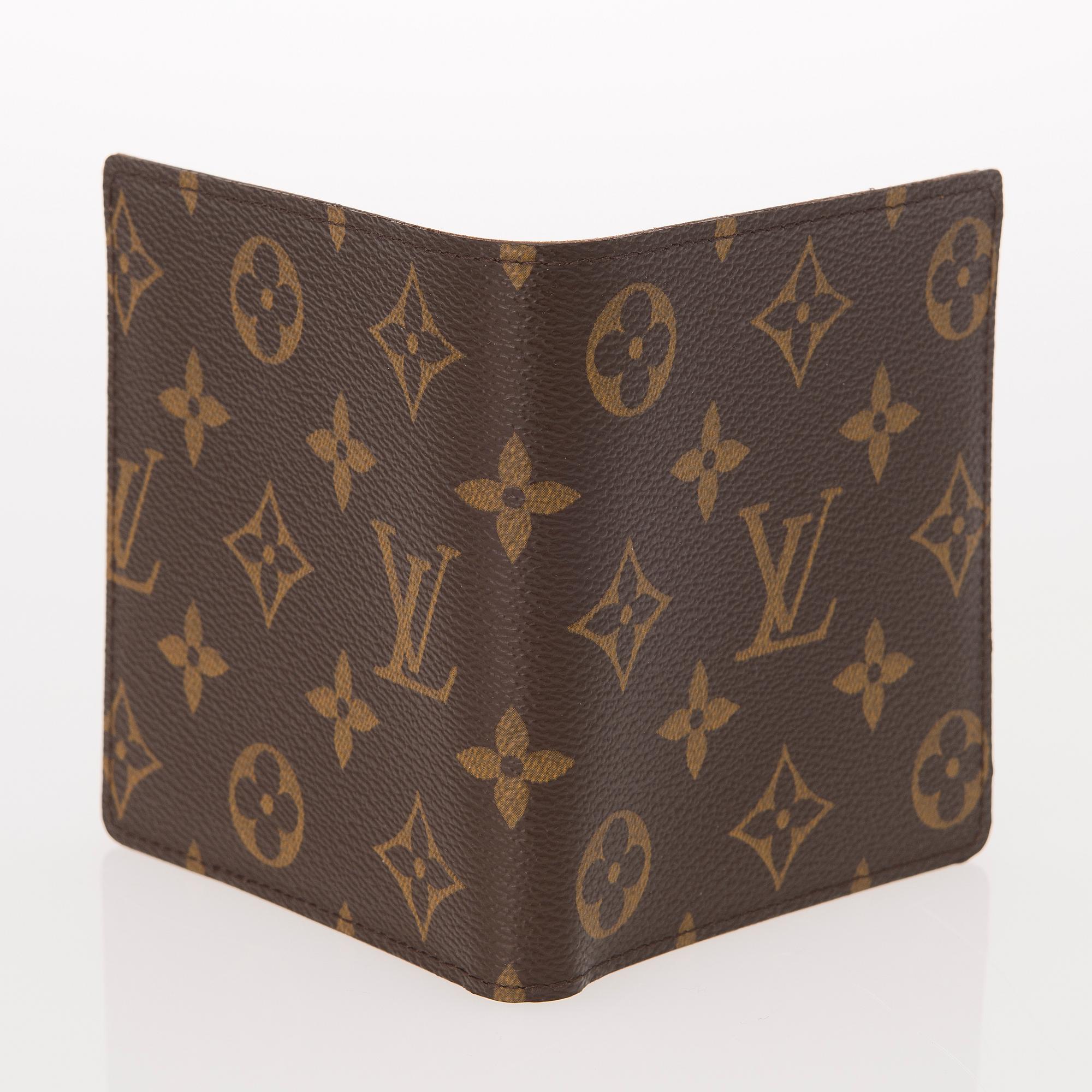 A Monogram Canvas Wallet / Card Holder.