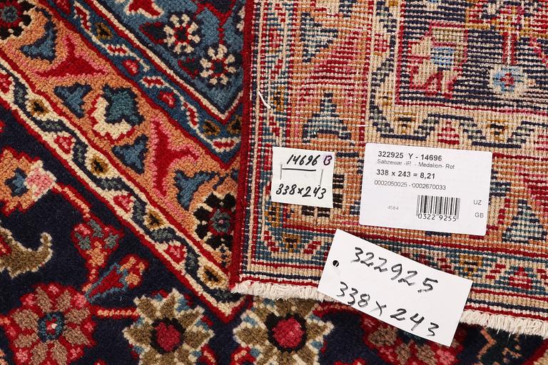 A carpet, Tabriz, ca. 335 x 243 cm.