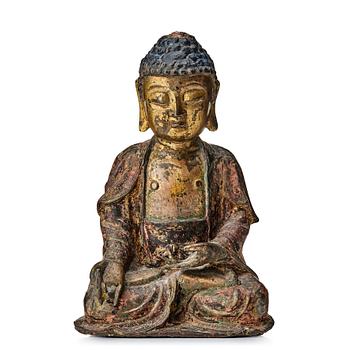 A seated bronze figure of buddha, Ming dynasty (1368-1644).