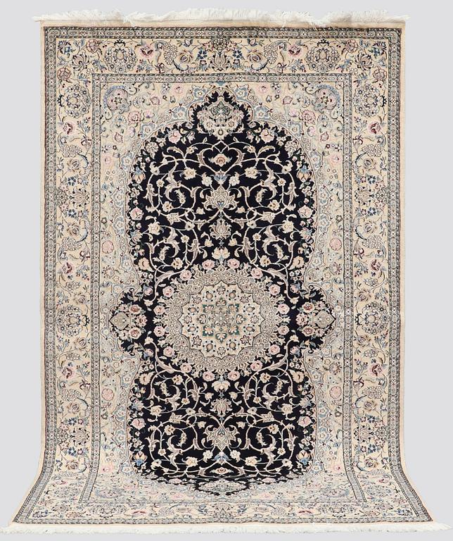 A rug, Nain Part Silk, so called 9 LAA, ca 243 x 150 cm.