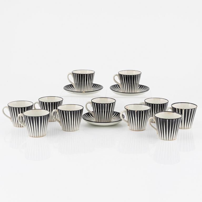 Eugen Trost, eleven coffee cups with three saucers, 'Zebra', Upsala-Ekeby Gefle.
