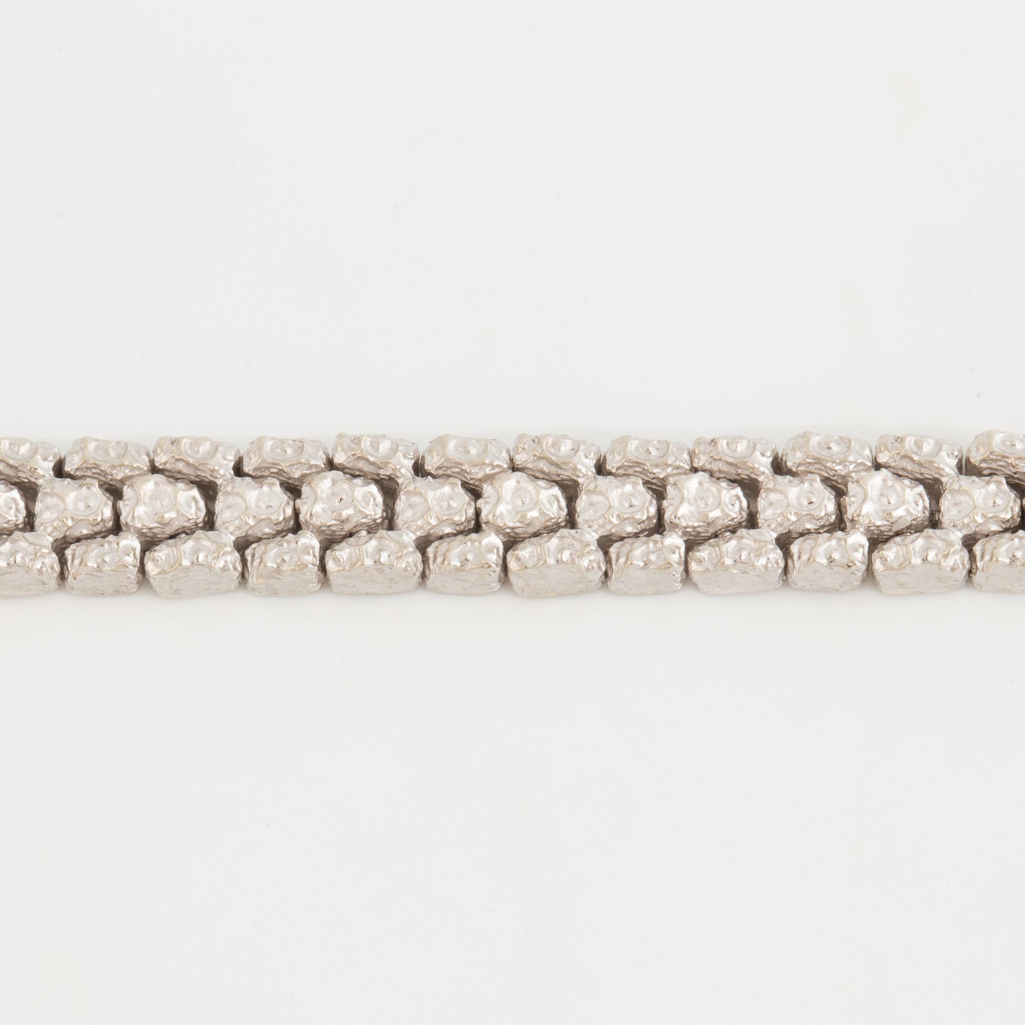 A fancy-link bracelet.