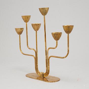 Gunnar Ander, a brass six-light candelabra from Ystad Metall.