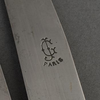 A set of twelve French 19th century ebony with silver dinner-knifes, unmarked.