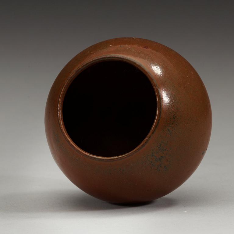 A Henan brown lotus shaped cup, Song dynasty (960-1279).