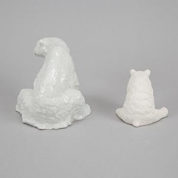 Five ceramic polar bears.