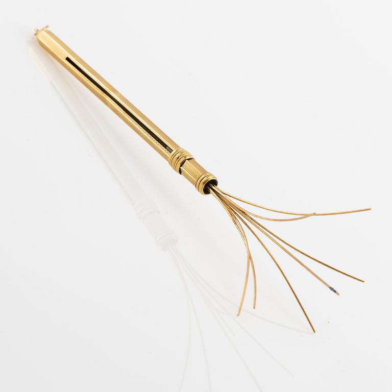 Champagne whisk 18K gold.