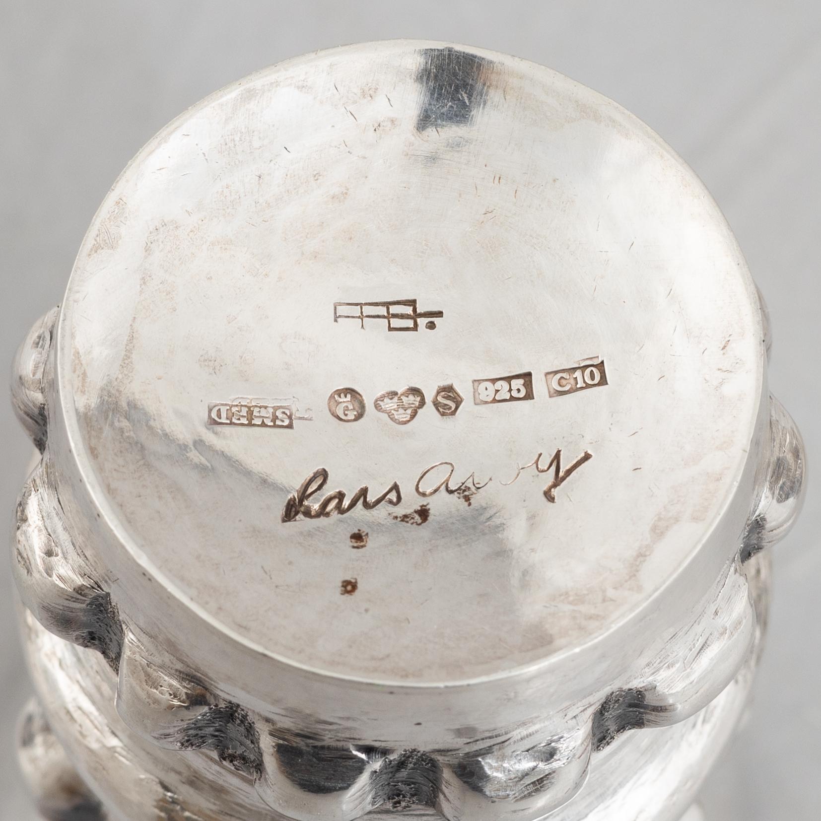 Three sterling silver miniature beakers/vases, marks of Lars Arby, Gothenburg, Sweden 1977-1982.