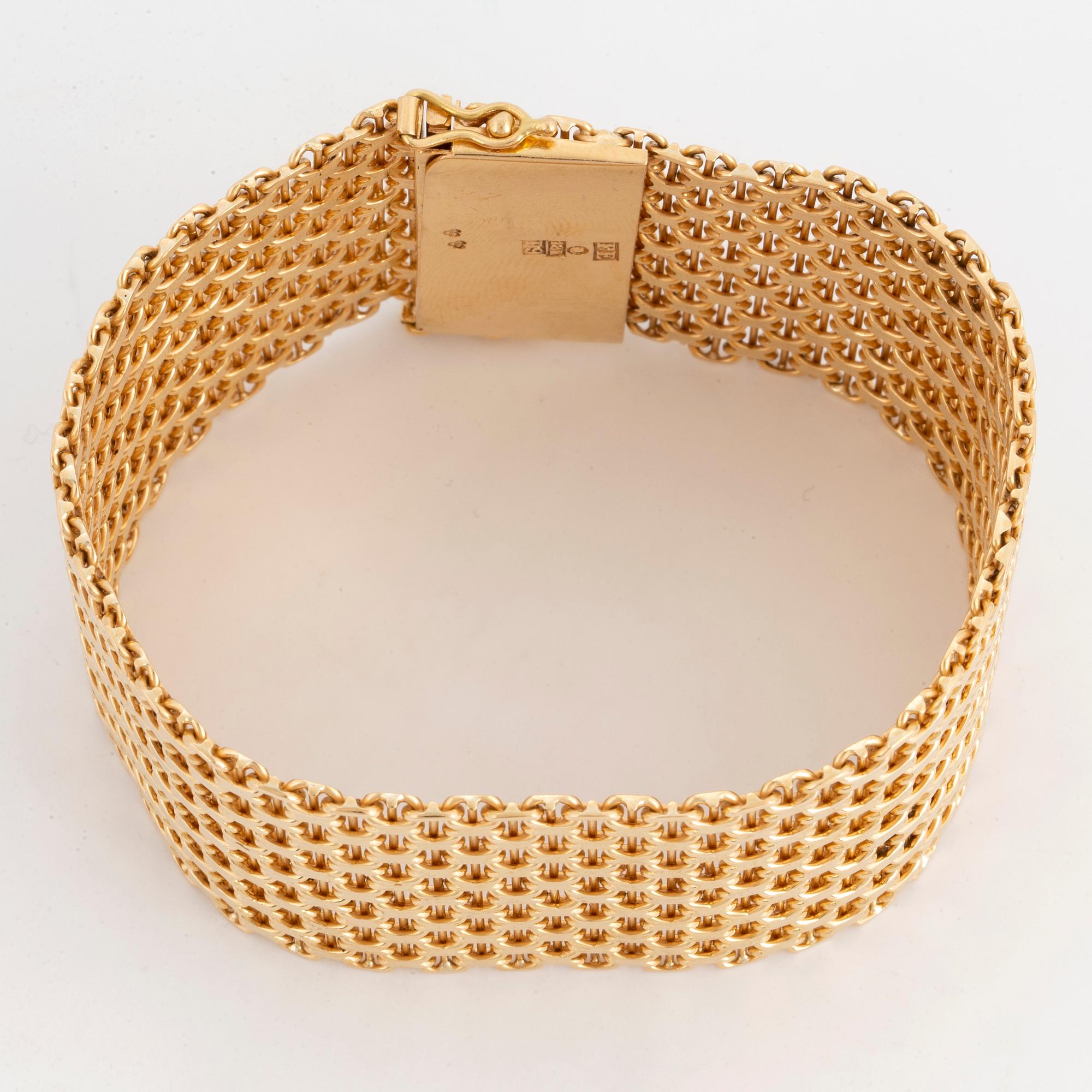 Armband "X-länk" 18K guld.