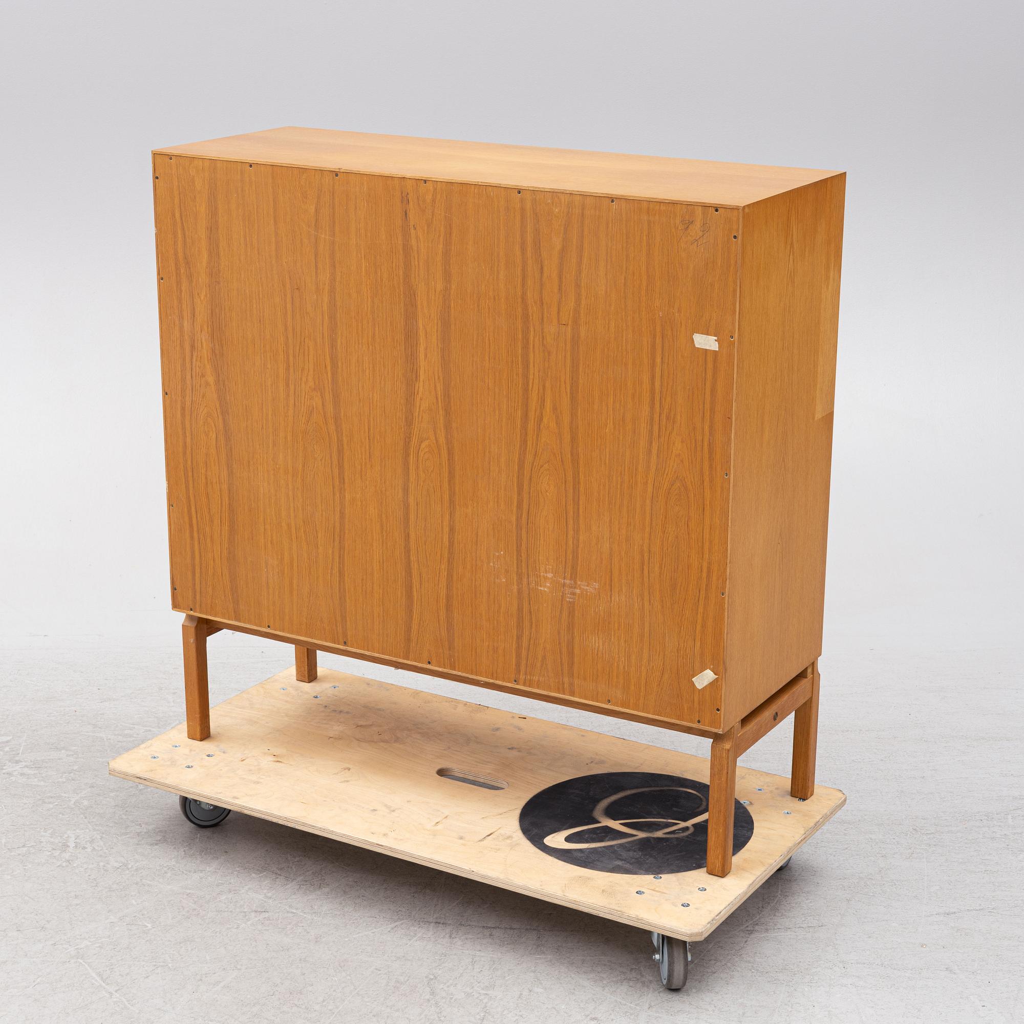An oak cabinet, second half of the 20th century.