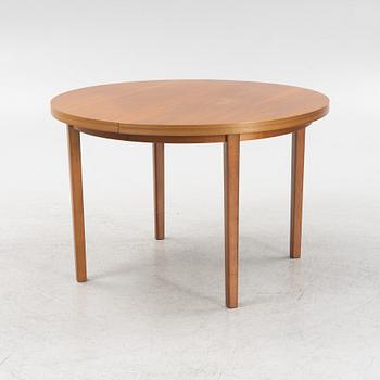 A round teak dining table, second part of the 20th Century.