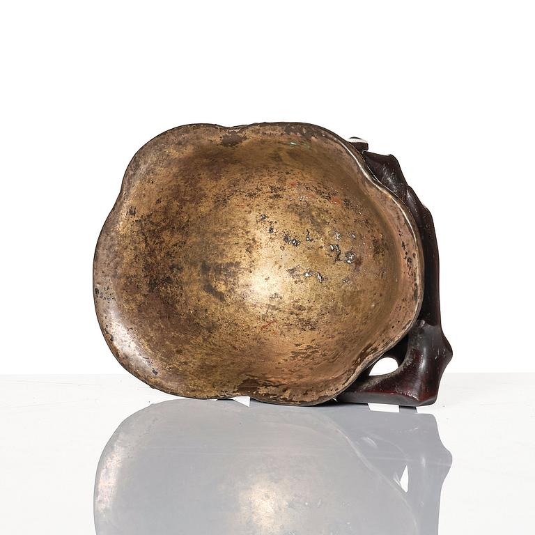 A sculptured wooden cup with silvered liner, Qing dynasty.