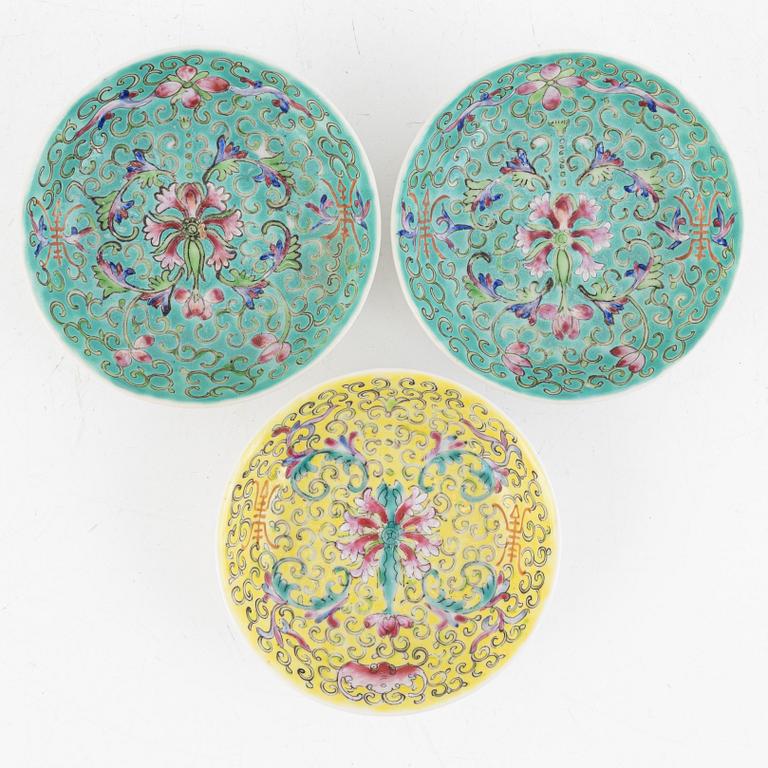 A group of three Chinese enamelled porcelain cups with covers and stands, three small dishes, 20th century.