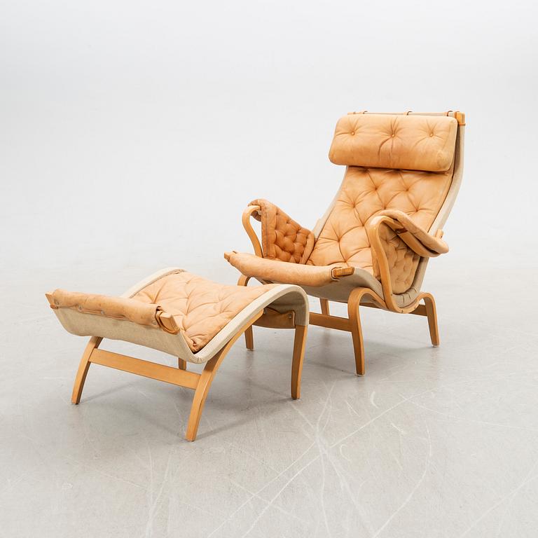 Bruno Mathsson, Armchair with footstool, "Pernilla", DUX, late 20th century.