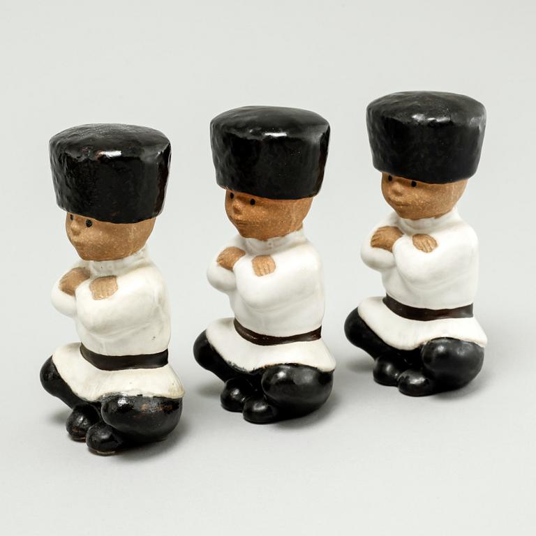 LISA LARSON, eight stoneware figurines from Gustavsberg, second half of the 20th century.