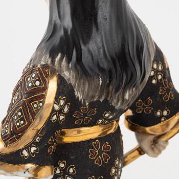 A pair of Japanese porcelain figurines, 20th century,