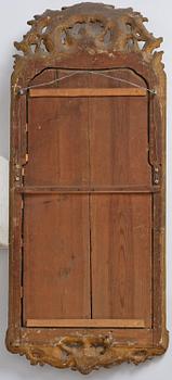 A Swedish gitlwood rococo mirror, Stockholm, later part 18th century.