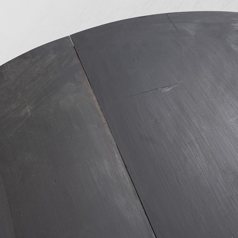 A painted dining table, late 19th Century.