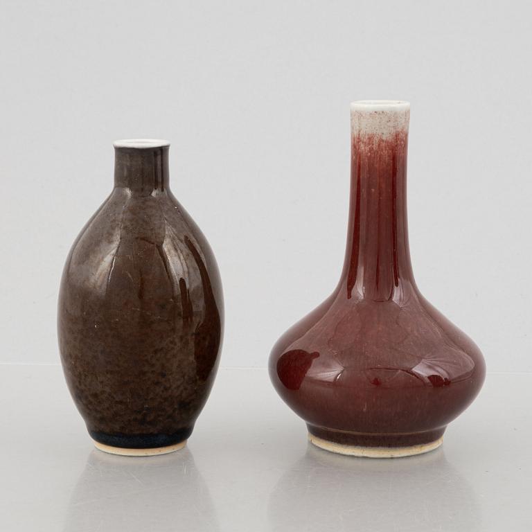 Four oxblood glazed porcelain vases, China, 20th century.