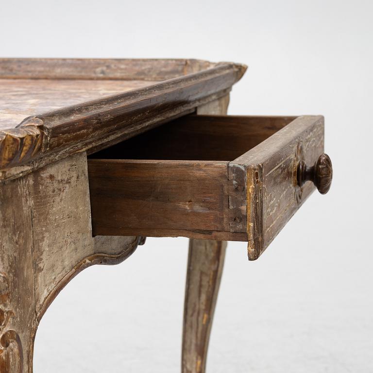 A Rococo table, 18th century.