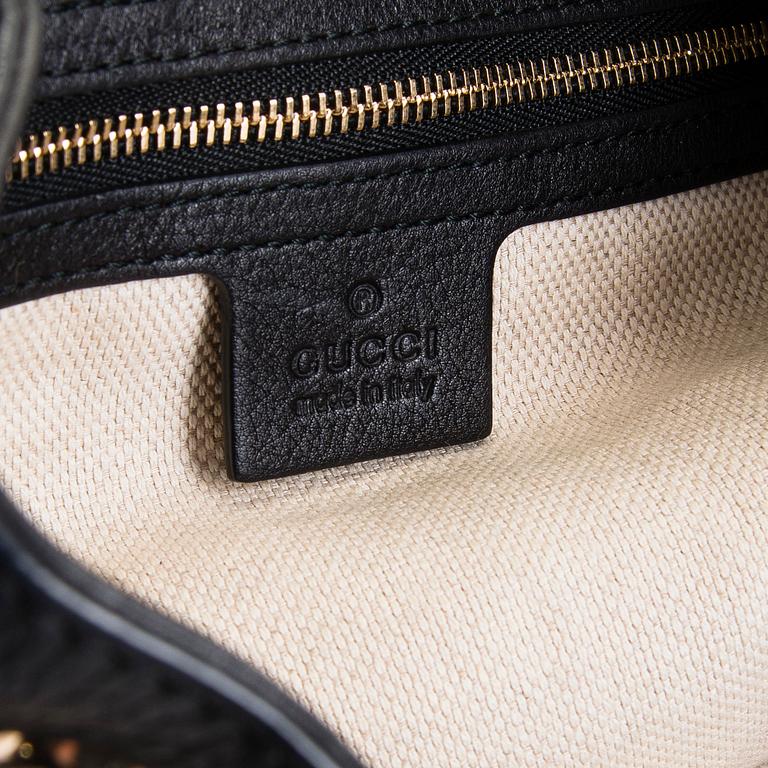 Gucci, a 'Soho' bag.
