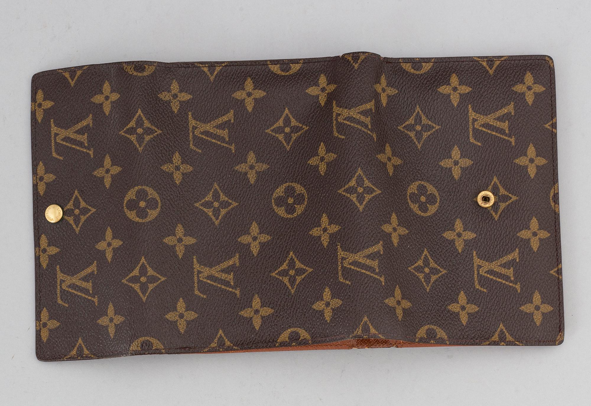 LOUIS VUITTON, a monogram canvas wallet.