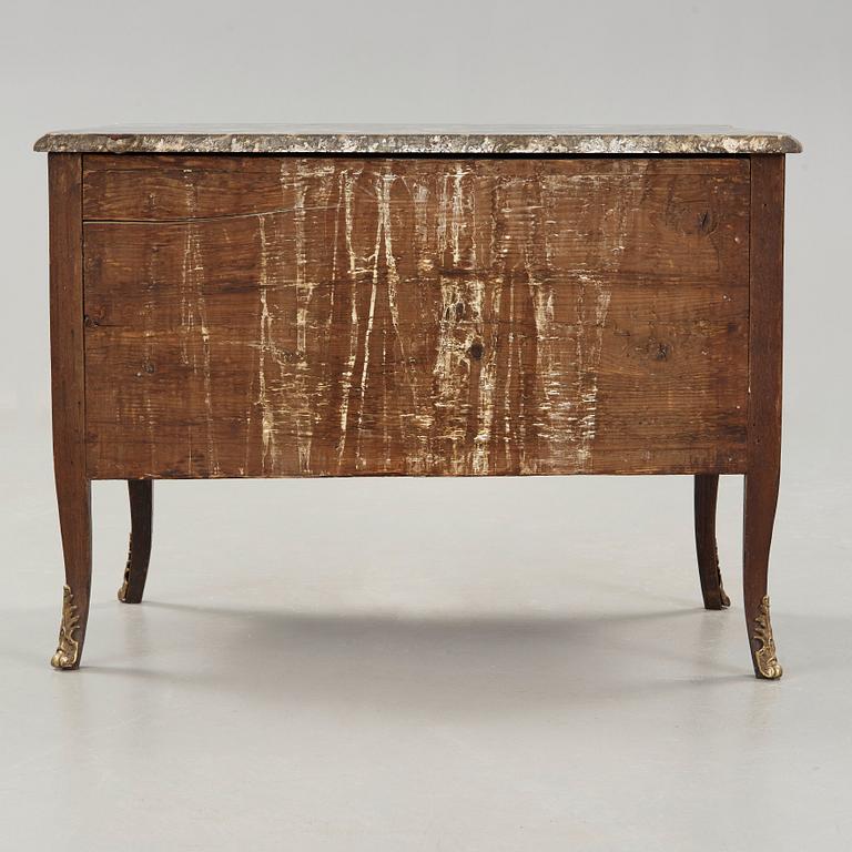 A Louis XV 18th century commode in the manner of Jacques Bircklé, master in Paris 1764.
