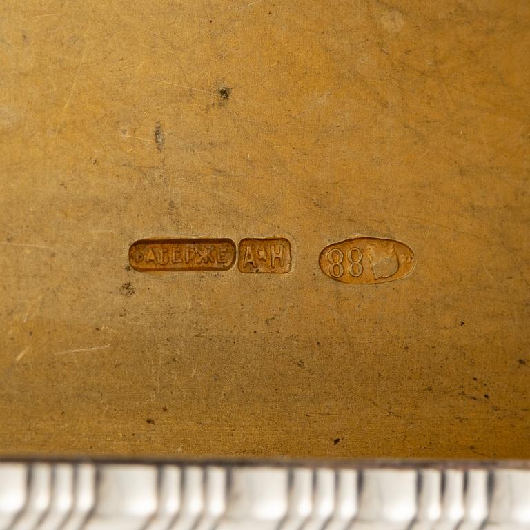 A Silver-gilt Fabergé Cigarette and Match Case, workmaster August Frederik Hollming, St. Petersburg 1908-1917.