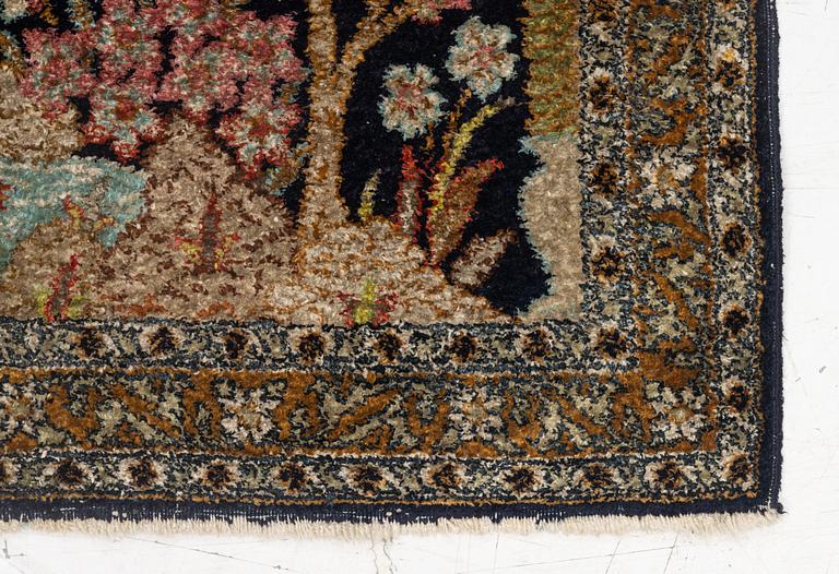 A semi-antique silk Ghom rug, central Iran, c. 32 x 23 in.