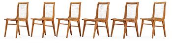 18. A Louis Sognot set of six ash, metal and rubber chairs, France 1950's.