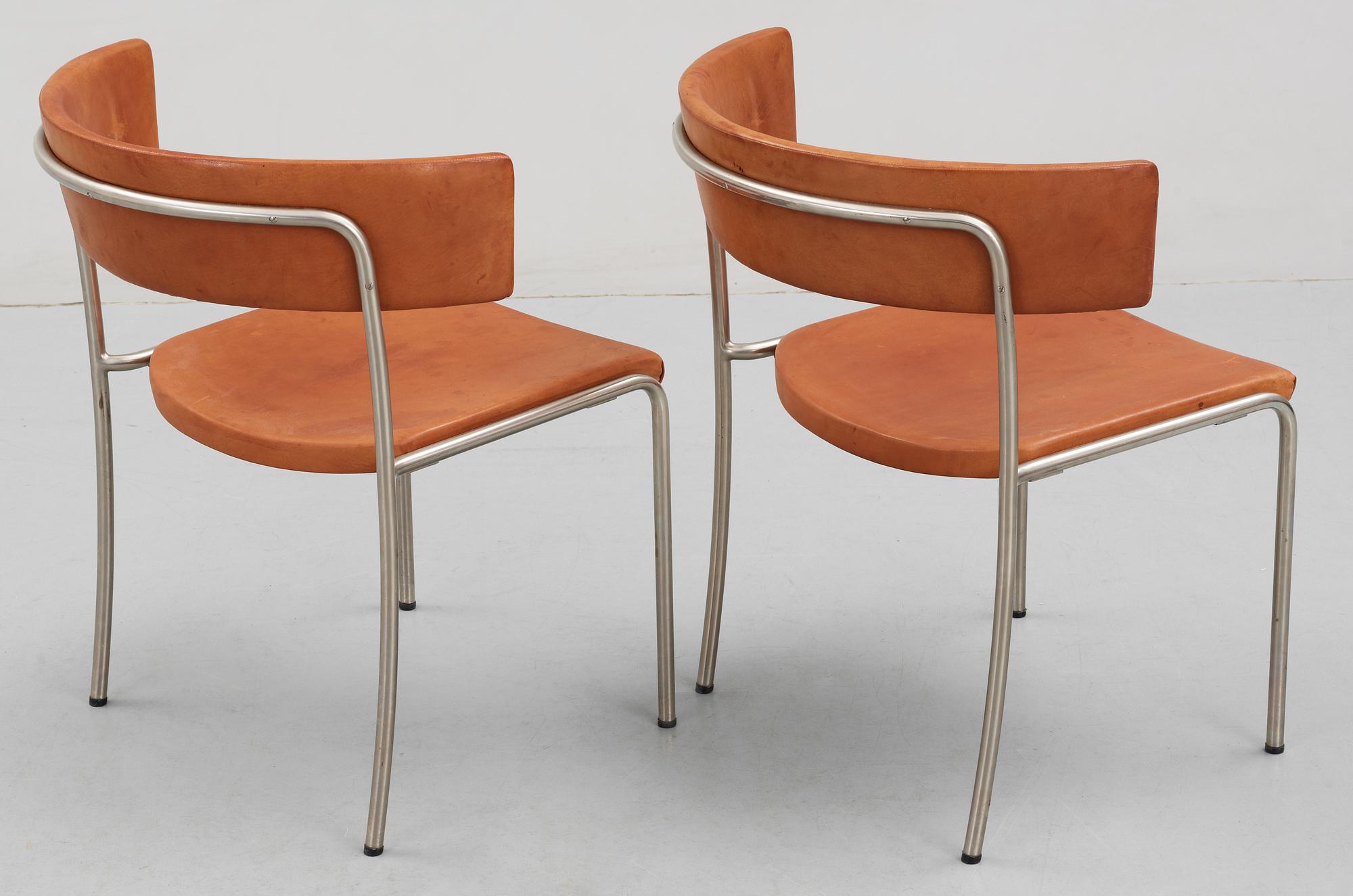 A pair of Erik Karlström steel and brown leather chairs,Stockholm ca 1965.