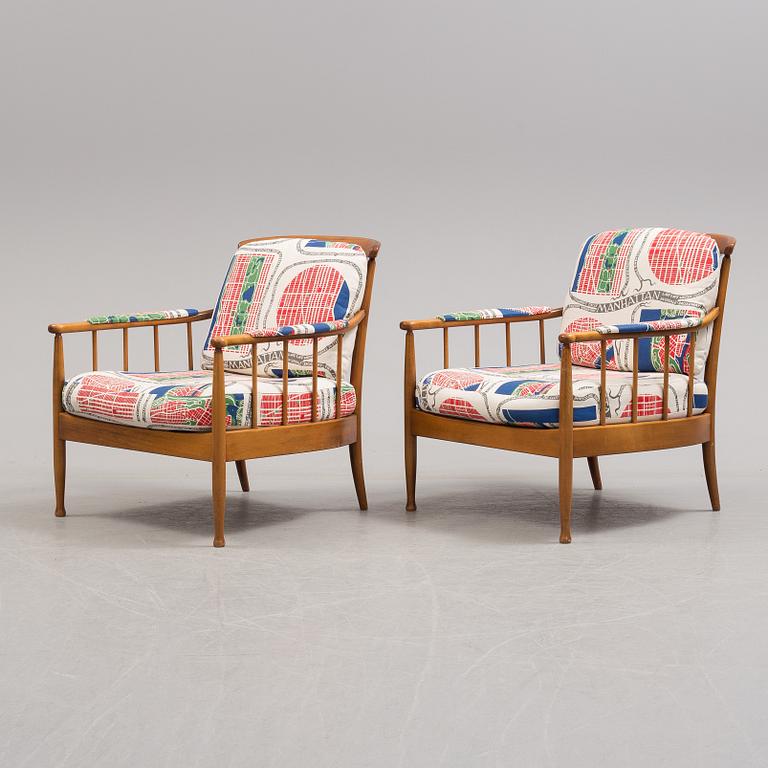 a pair of "Skrindan" armchairs, by Kerstin Hörlin-Holmquist, OPE.